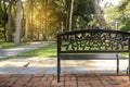 Stylish black iron bench  in summer park Royalty Free Stock Photo