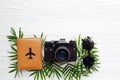 Stylish black sunglasses, passport with plane and photo camera o Royalty Free Stock Photo