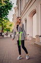 Stylish blogger posing on the street