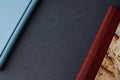 Stylish blue and burgundy photobooks with leather covers and hardcovers Royalty Free Stock Photo