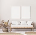 Stylish boho living room interior with design wooden sofa, rattan basket and trendy carpet. Frame mock up in cozy apartment.