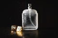 Bottle of wet perfume with cuff Royalty Free Stock Photo