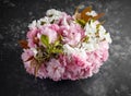 Stylish bridal bouqet of tender white and pink sakura flowers