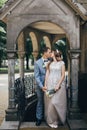 Stylish bride and groom kissing and embracing on background of old church. Romantic moment. Provence wedding. Beautiful sensual Royalty Free Stock Photo