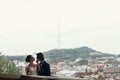 Stylish bride and groom posing on background of in city Lviv in Europe. happy luxury wedding couple embracing and looking at each Royalty Free Stock Photo