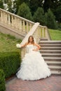 Stylish bride in white dress