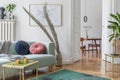 Stylish, bright, Scandinavian living room and dining room. Royalty Free Stock Photo