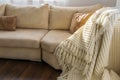 Top view of stylish brightly part of living room with old vintage suitcase and potted plant on luxury wooden floor