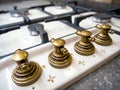 Stylish bronze handles of the new gas stove