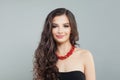 Stylish brunette model woman with long hair and red coral necklace, portrait Royalty Free Stock Photo