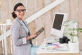 Stylish brunette working from home