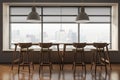 Stylish cafe interior with four bar stool, table and panoramic window