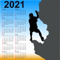 Stylish calendar with silhouette rock climber on against the blue sky for 2021