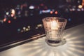 Stylish candle and the city of night view