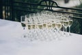 Stylish champagne glasses on wedding table. luxury drinks for ce