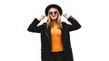 Stylish cheerful young woman having fun model posing wearing a black coat, round hat isolated on a white background Royalty Free Stock Photo
