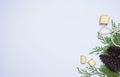 Stylish christmas composition. fir branches, cones and christmas gifts on white background. flat lay top view.