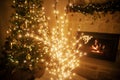 Stylish christmas illuminated tree on background of decorated tree with golden lights bokeh and burning fireplace in evening room