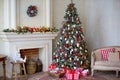 Stylish Christmas interior decorated in white and red colors Royalty Free Stock Photo