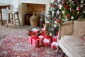 Stylish Christmas interior decorated in white and red colors Royalty Free Stock Photo