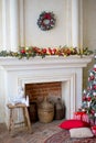 Stylish Christmas interior decorated in white and red colors Royalty Free Stock Photo