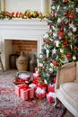 Stylish Christmas interior decorated in white and red colors Royalty Free Stock Photo
