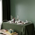 Stylish Christmas interior with dining table and gifts around, 3d render