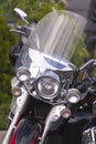 Stylish classic motorcycle with protective windshield front view