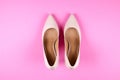 Top view of fashionable feminine medium heeled women`s leather shoes of pastel colors on heels / wedge for spring-summer season. Royalty Free Stock Photo