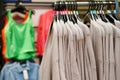Stylish clothes on hangers in the store Royalty Free Stock Photo