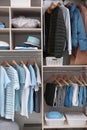 Stylish clothes and home stuff in large wardrobe Royalty Free Stock Photo