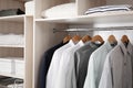 Stylish clothes and home stuff in large wardrobe Royalty Free Stock Photo