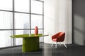 Stylish composition of modern living room interior in skyscraper building with design armchair and green round table, vinyl floor