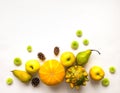 Stylish composition of pumpkins, fruits, flowers, cones. Top view on white background. Autumn flat lay