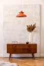 Stylish composition of retro living room with vintage furnitures, lamp, decoration and personal accessories Royalty Free Stock Photo