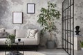 The stylish compostion at living room interior with design gray sofa, coffee table, plant, hanger, lamp and elegant personal Royalty Free Stock Photo