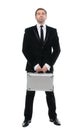 Stylish confident businessman with metal suitcase. Full-length.