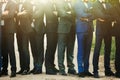 stylish confident men in suit standing posing, reception at luxury wedding, rich graduation at school or university, business Royalty Free Stock Photo