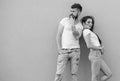 Stylish couple. Modern youth choose comfortable clothing. Fashion trend comfortable simple clothing for man and woman