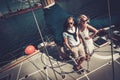 Stylish couple on a yacht Royalty Free Stock Photo