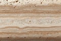 Stylish Cream Striped Travertine Surface with Sophisticated Geological Patterns for Artistic Use Royalty Free Stock Photo