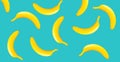 Stylish creative image many yellow bananas on blue background Royalty Free Stock Photo