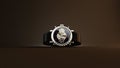 Stylish 3D wrist watch on a dark background Royalty Free Stock Photo