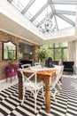 Stylish dining room with a glass roof