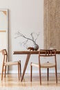 Stylish dining room in japandi interior design style. Royalty Free Stock Photo