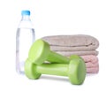 Stylish dumbbells, bottle of water and towels. Home fitness Royalty Free Stock Photo