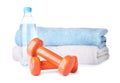 Stylish dumbbells, bottle of water and towels. Home fitness Royalty Free Stock Photo