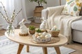 Stylish Easter Coffee Table with Ceramic Rabbits, Decorative Eggs, and Scandinavian Charm Royalty Free Stock Photo
