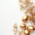 Stylish Easter gold eggs with golden dried flax linum bunch, white background