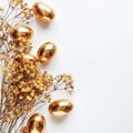 Stylish Easter gold eggs with golden dried flax linum bunch, white background